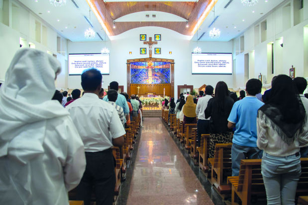 <p>A prayer meeting was held in memory of Kim Fernandez, a long-time resident of the kingdom and mother of Bahrain-born Bollywood actress Jacqueline Fernandez, at the Sacred Heart Catholic Church, Manama, yesterday.</p><p>The 71-year-old Malaysian-Canadian national died last month in Mumbai following a long battle with cancer. She was cremated in India.</p><p>Mrs Fernandez, who lived in Bahrain for more than 50 years, leaves behind husband Elroy, daughters Jacqueline and Geraldine, and sons Warren and Ryan. Left,the prayer meeting being held at the church. Right, Jacqueline with her father Elroy at the event.</p>
